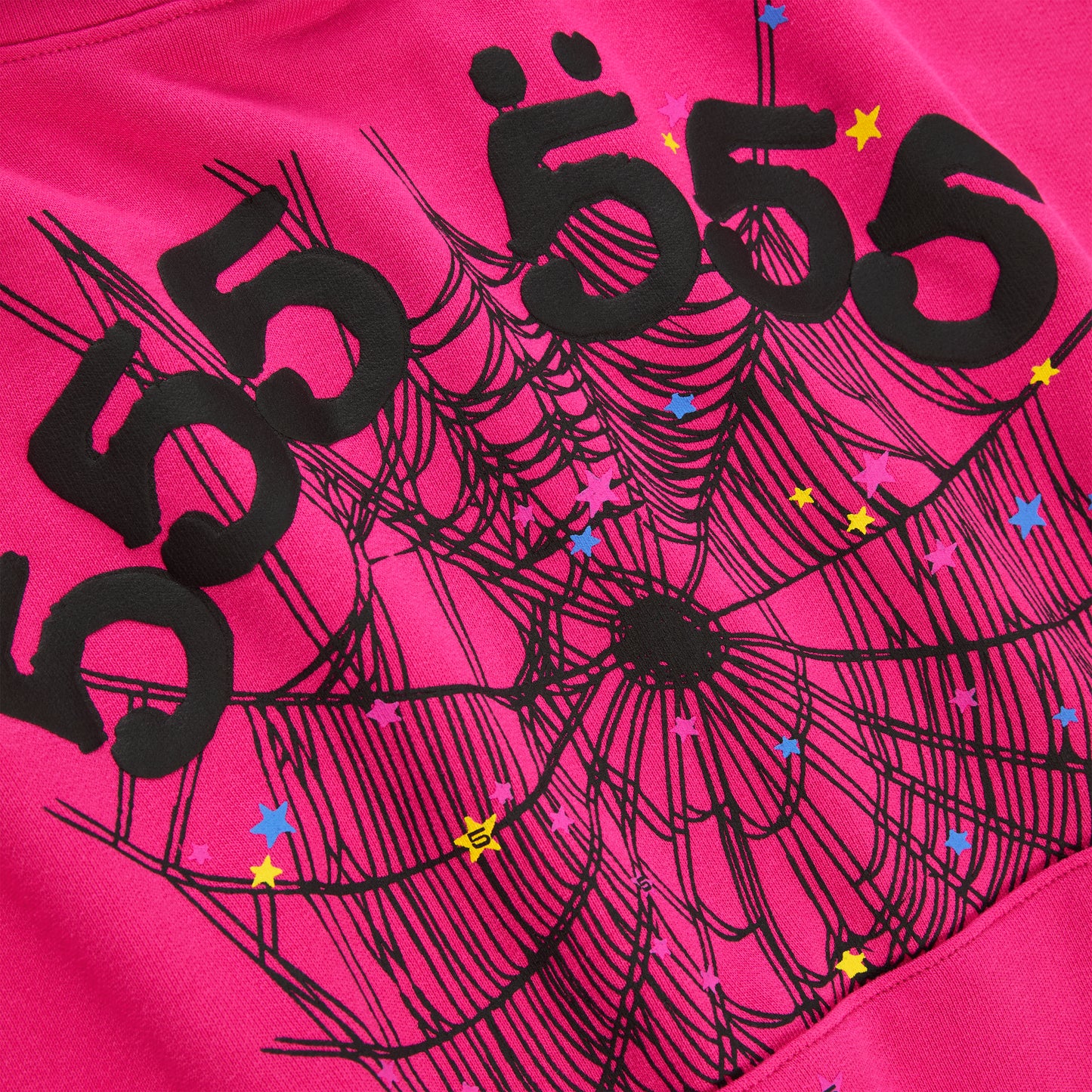 Pink 100% cotton fleece hoodie with black '555' angel numbers, web print, and scattered stars.