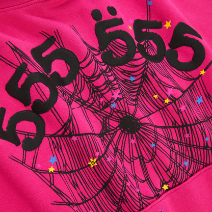 Pink 100% cotton fleece hoodie with black '555' angel numbers, web print, and scattered stars.