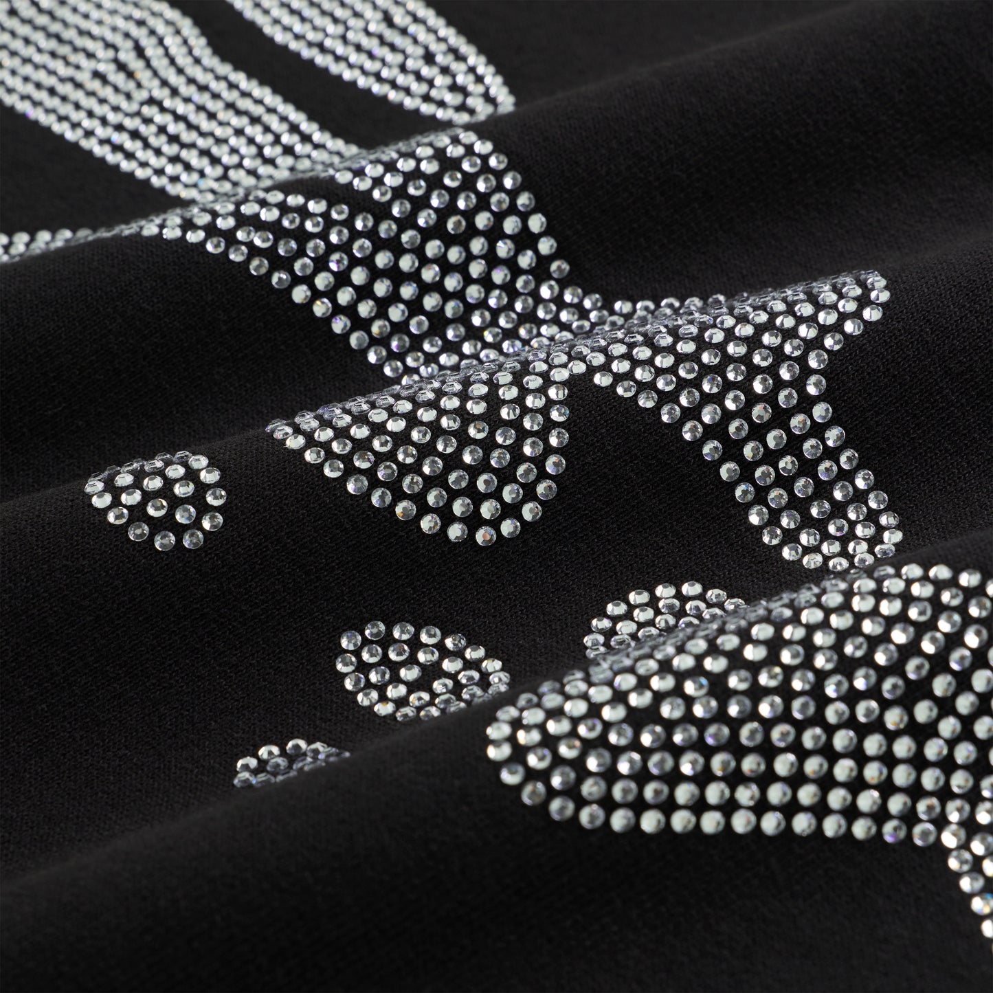 Black 100% cotton crewneck with sparkling rhinestone embellished graphic.