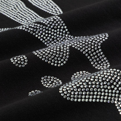Black 100% cotton crewneck with sparkling rhinestone embellished graphic.