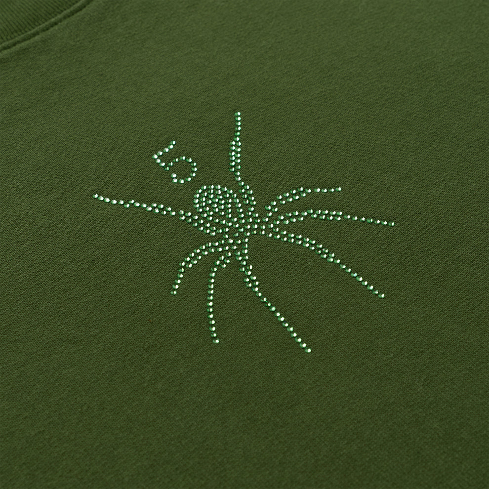 Olive green cotton crewneck with a sparkling green rhinestone spider graphic.