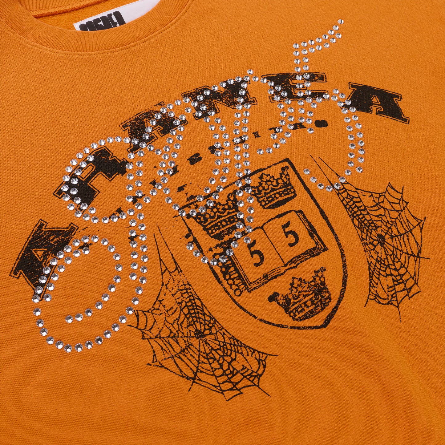 Orange ARANEA CREWNECK with black spiderweb graphic and rhinestone "ARANEA" text.