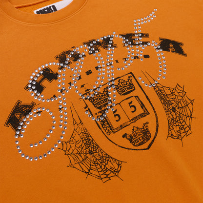 Orange ARANEA CREWNECK with black spiderweb graphic and rhinestone "ARANEA" text.