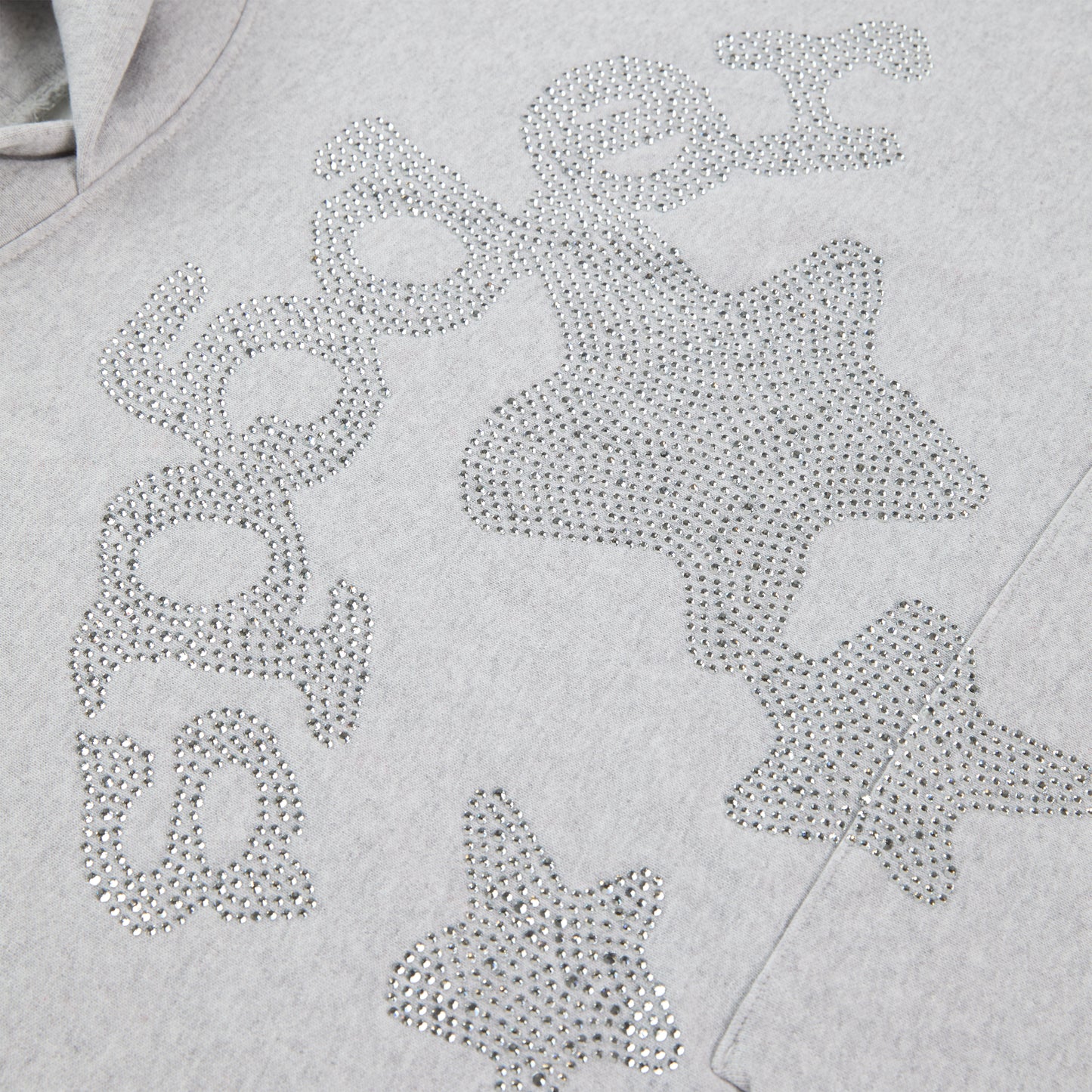 Light grey cotton fleece hoodie with rhinestone "SP5DER" text and star design.