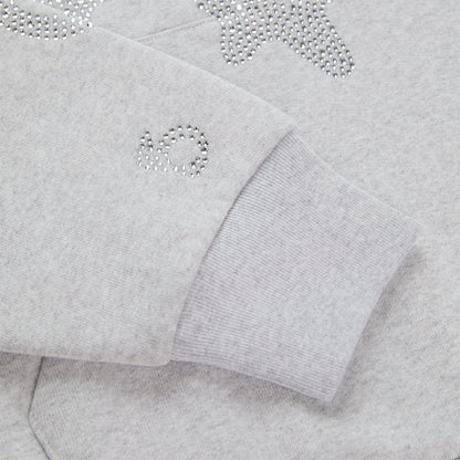 Light grey cotton fleece hoodie with rhinestone 'SP5DER' and star design on sleeve.
