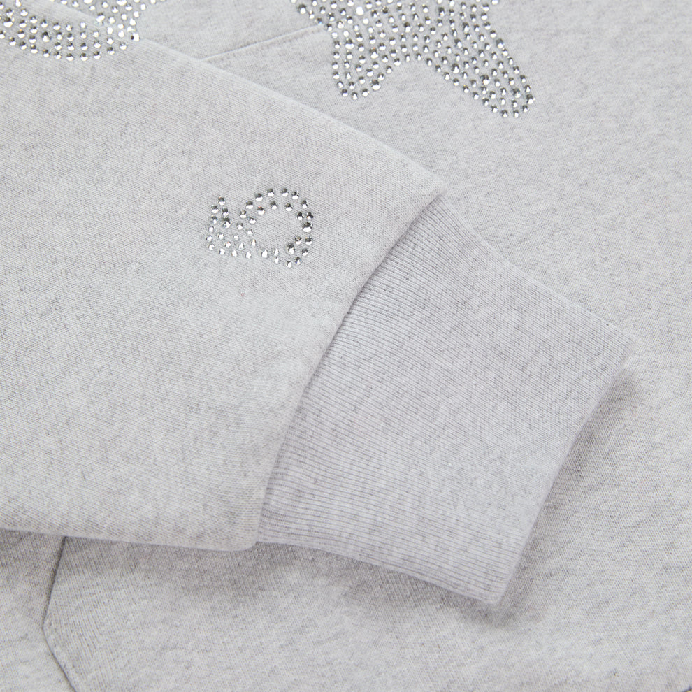 Light grey cotton fleece hoodie with rhinestone 'SP5DER' and star design on sleeve.