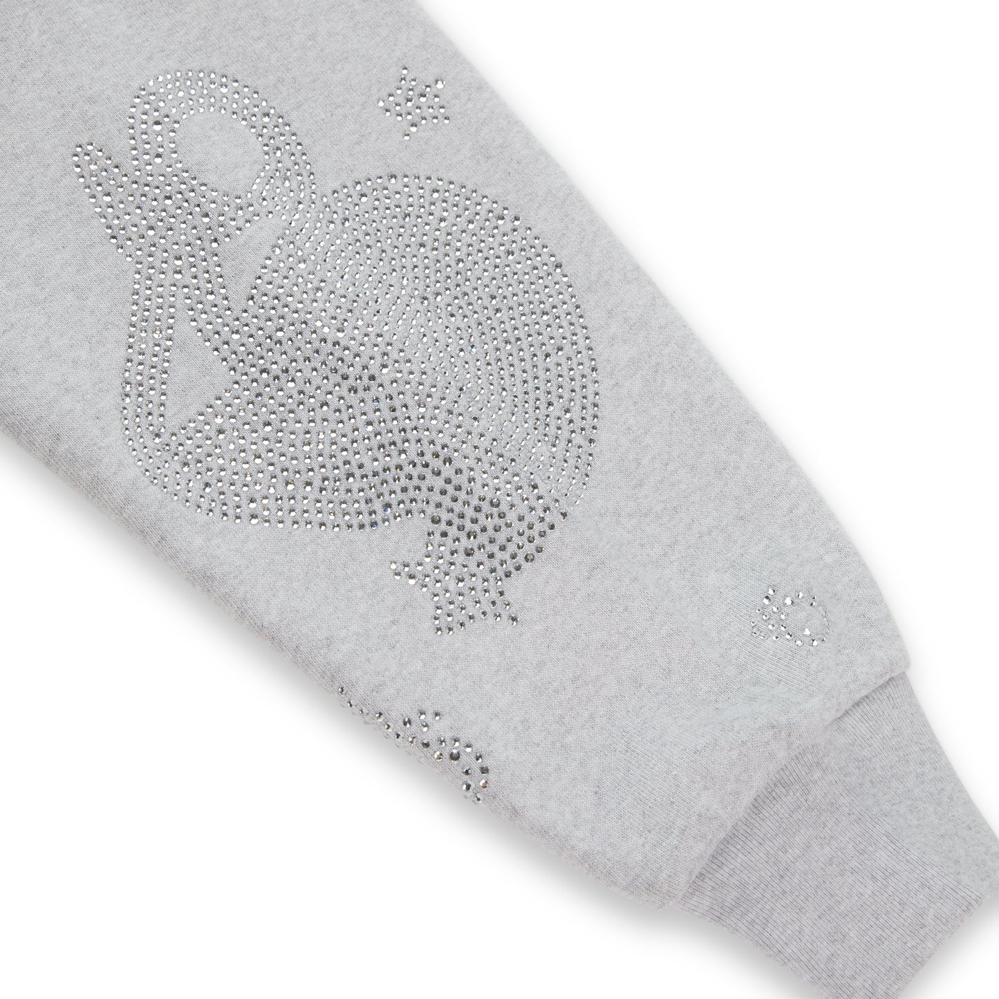 Light grey cotton fleece hoodie sleeve with rhinestone 'SP5DER' and star design.