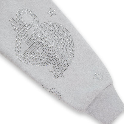 Light grey cotton fleece hoodie sleeve with rhinestone 'SP5DER' and star design.