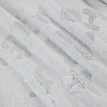 Gray 100% cotton fleece hoodie with rhinestone "SP5DER" text and star embellishments.