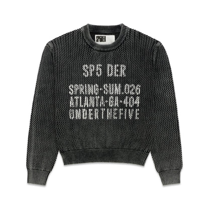 Black knit cotton UNDERTHEFIVE sweater with white text print at chest, ribbed crewneck, hem, and cuffs.