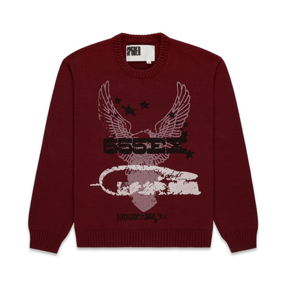 Maroon knit sweater with a distressed graphic print featuring an eagle, stars, and "555EX Houston, TX".