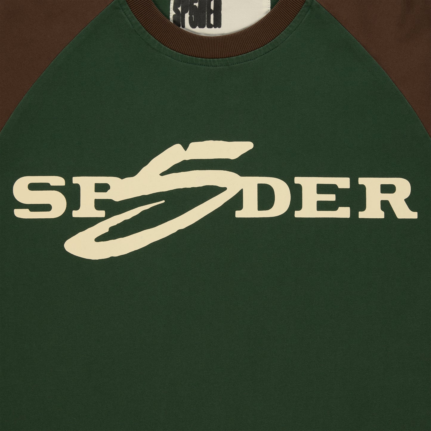 Green and brown color-block 5UKI TEE with a cream graphic print on the front.
