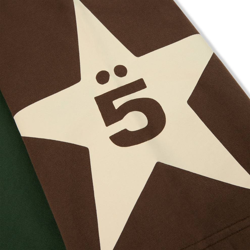 Brown and green color-block 5UKI TEE sleeve with large cream star and "5" graphic print.