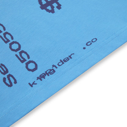 Light blue cotton tee with dark blue "krigider.co" and pixelated dollar sign graphic print.