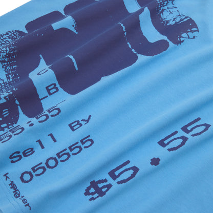 Light blue 100% cotton tee with dark blue graphic print featuring numbers and text.