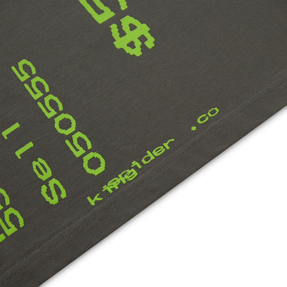 Dark gray cotton tee with bright green pixelated "Sell" text and dollar signs.