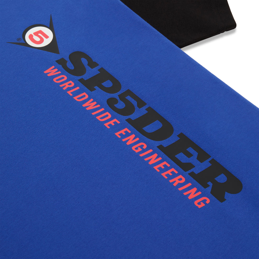 Blue cotton tee with black contrast sleeve, "SP5DER WORLDWIDE ENGINEERING" graphic.