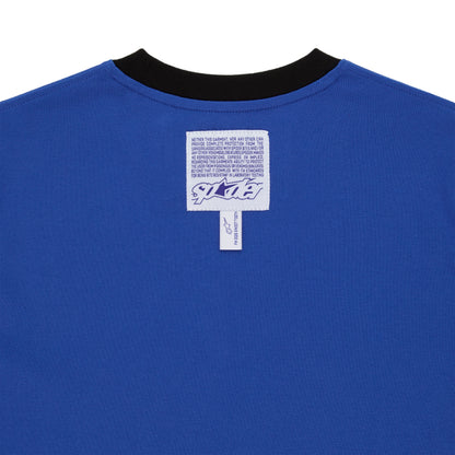 Back of blue cotton ENGINEER TEE with black contrast neck, woven logo label, and graphic print.