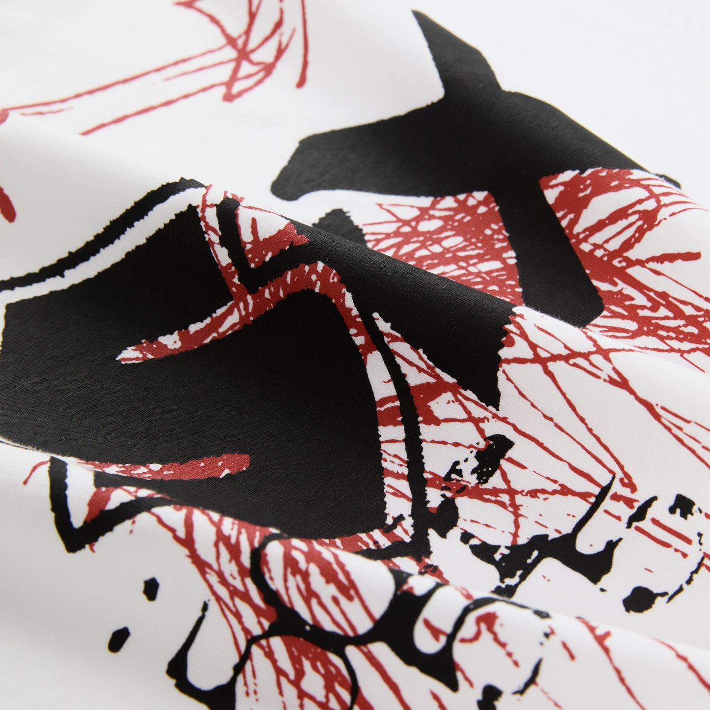 White cotton Vivienne Tee with black and red graphic print.