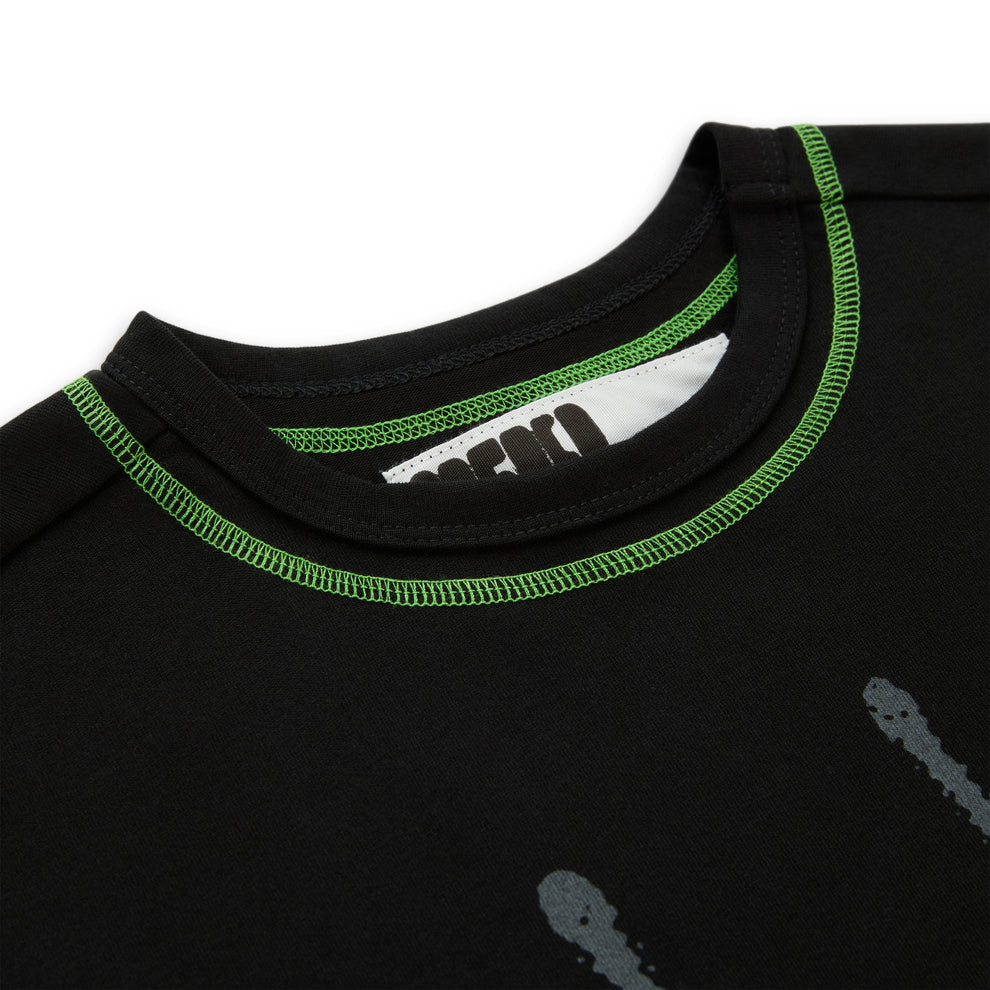 Black cotton long sleeve tee with neon green contrast stitching and a graphic print.