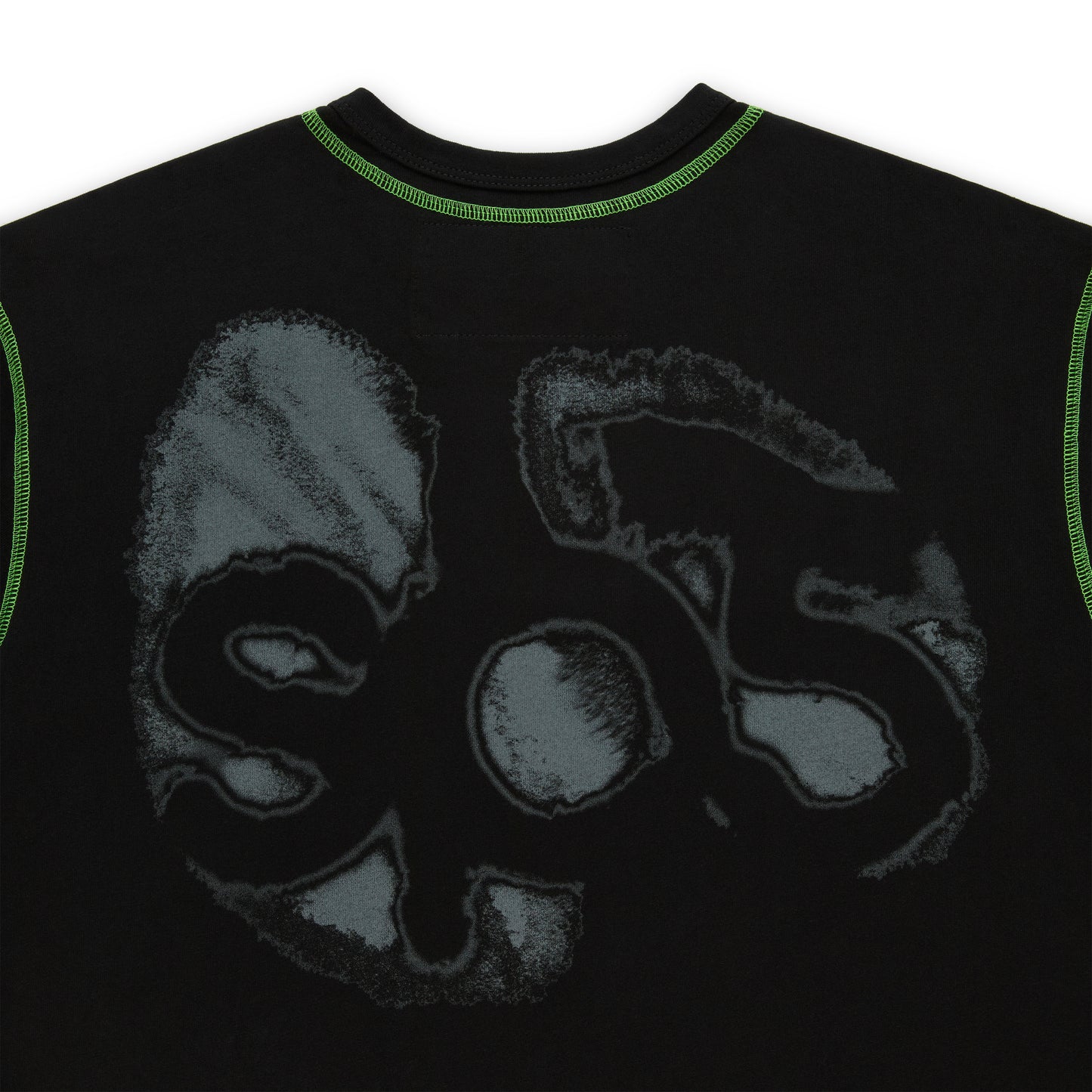Black cotton long sleeve tee with green contrast stitching and a faded grey graphic print.