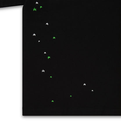 Black 100% cotton lightweight tee with scattered white and green star print.