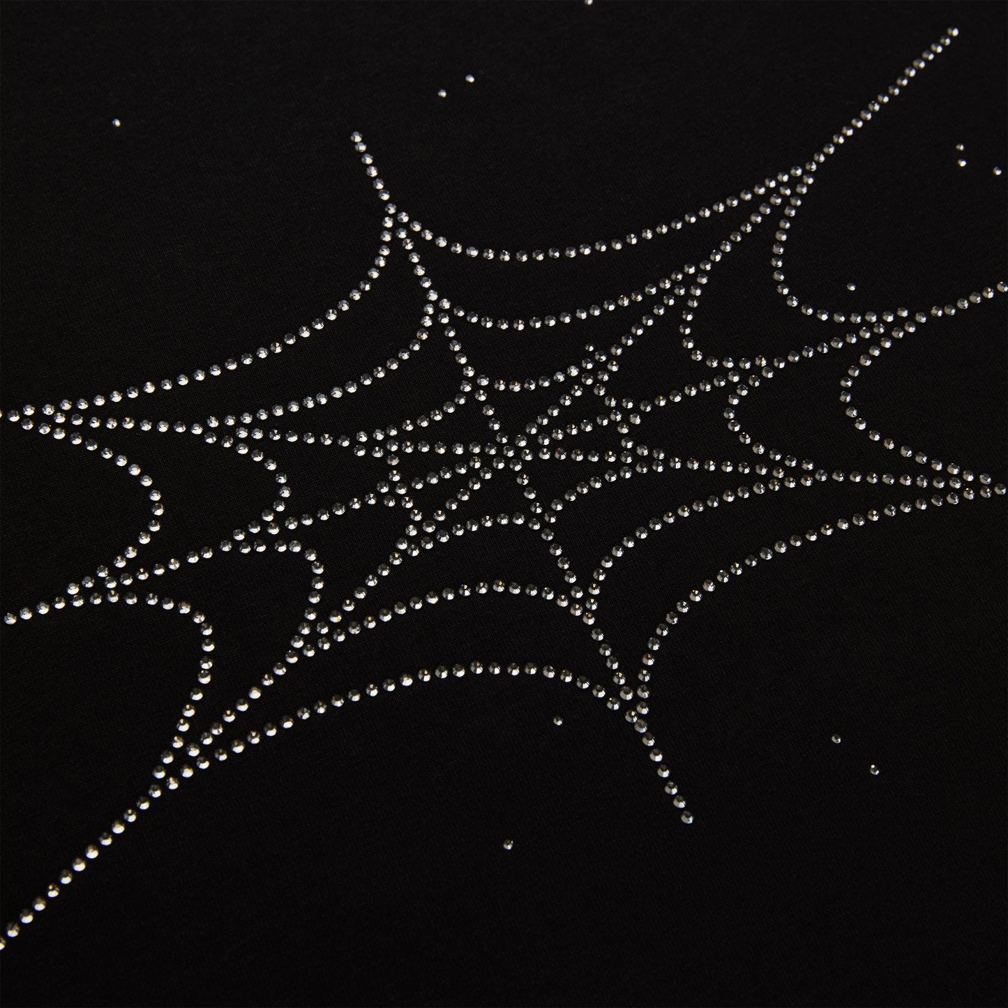Black cotton tee with a sparkling rhinestone spiderweb graphic.