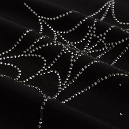 Black cotton tee with sparkling rhinestone spiderweb graphic.