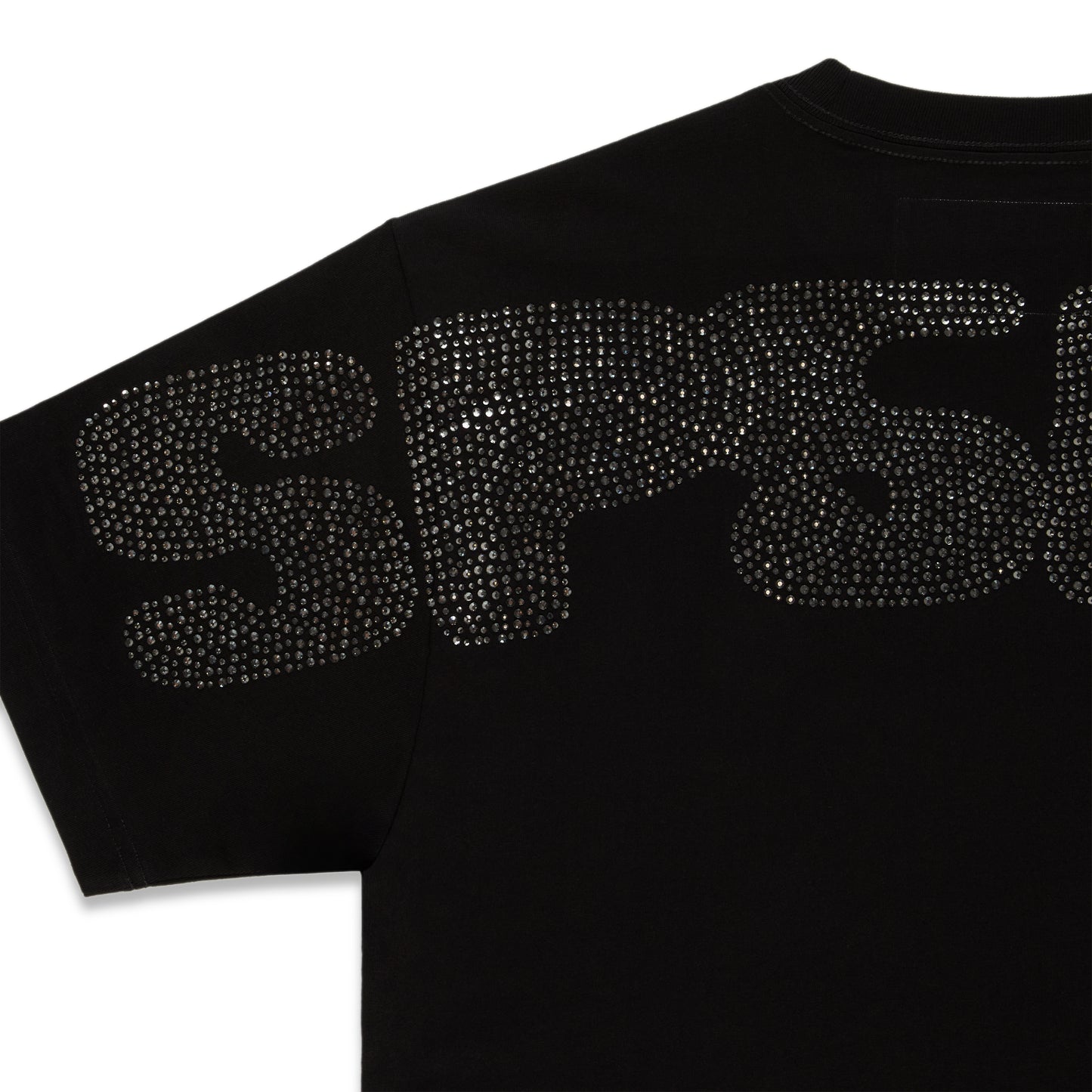 Black cotton tee with sparkling rhinestone graphic on the back.