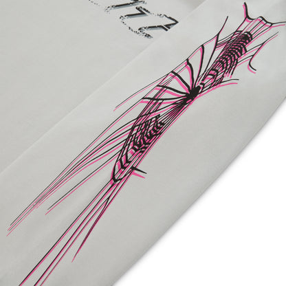 WAIT LONGSLEEVE: Light grey 100% cotton long sleeve tee with a vibrant pink and black graphic print on the sleeve.