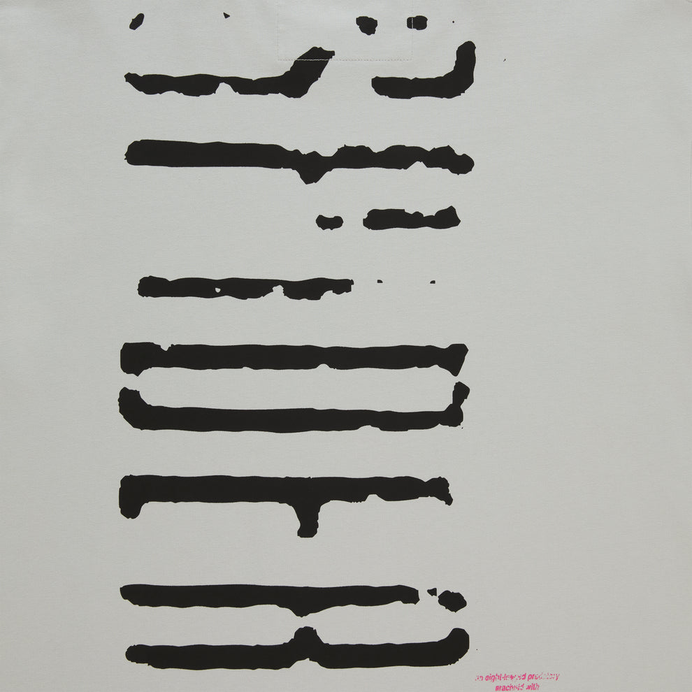 White cotton long sleeve tee with black graphic print and red text.