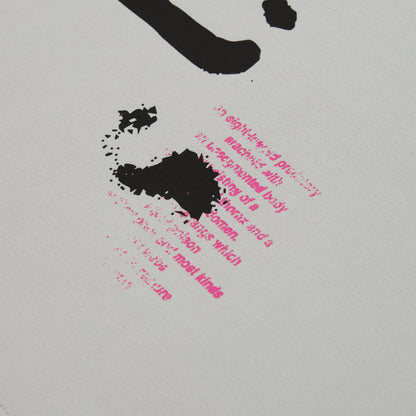 White cotton long sleeve tee with black and pink graphic print detail.