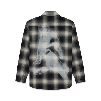 Black and beige plaid cotton flannel shirt with a faded white graphic print on the back.