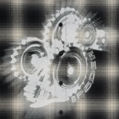 Black and beige plaid cotton flannel shirt with faded white graphic print of gears.