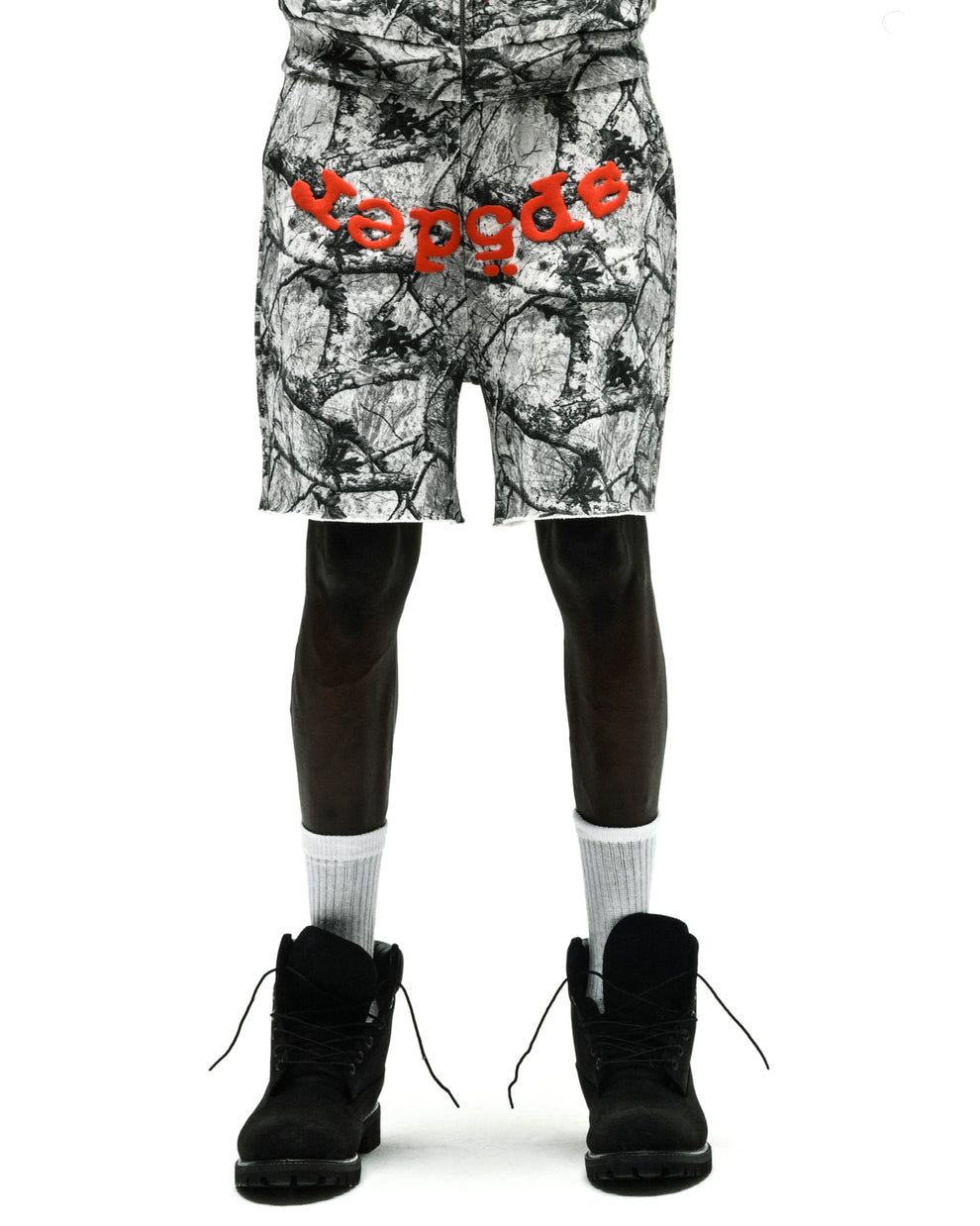 REALTREE OG WEB V2 SWEATSHORT: Black and white camo fleece shorts with red "YEEZY" print, drawcord, raw hem.