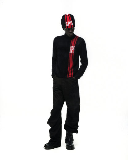 Black mohair knit zip sweater with red vertical stripe and "SP5" logo, paired with matching beanie and black pants.
