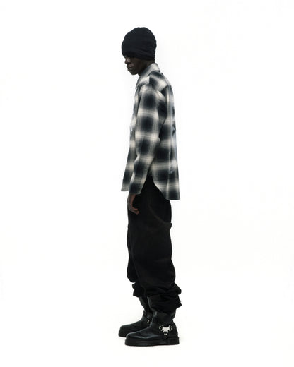Burnout Flannel: Black and white faded plaid cotton flannel shirt with spread collar, button closure, and shirttail hem.