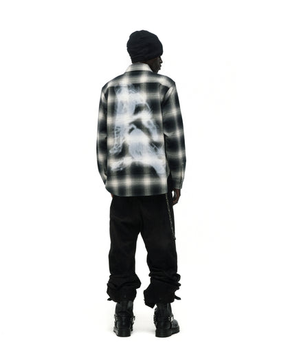 Burnout Flannel: Black and white plaid cotton shirt with faded graphic print on back.
