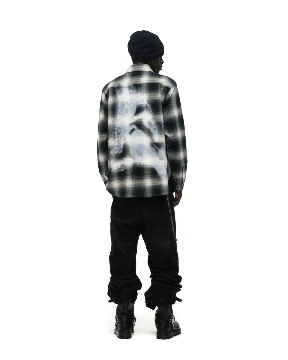 Burnout Flannel: Black and white plaid cotton shirt with faded graphic print on back.