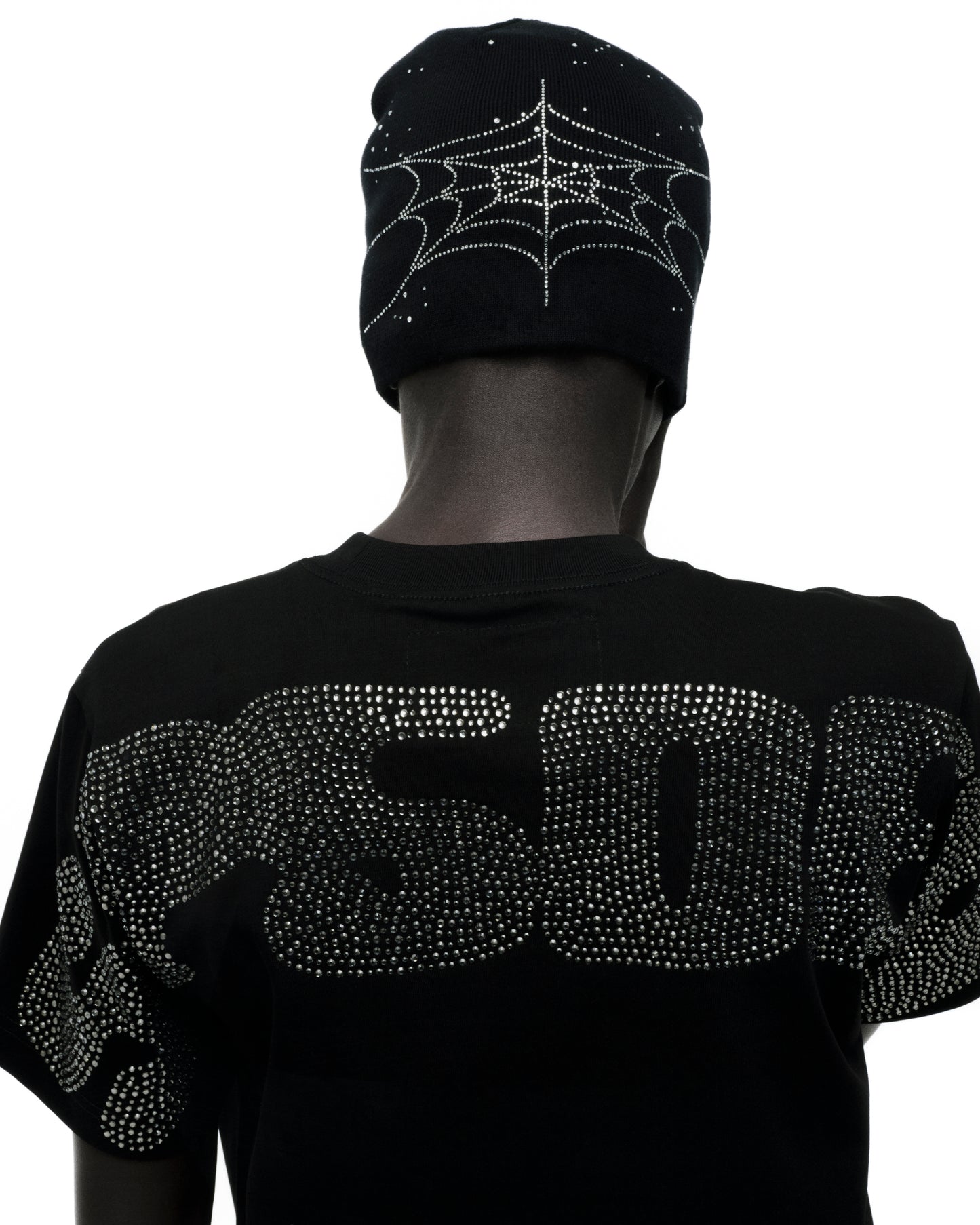 Black cotton tee with rhinestone "508" graphic on back, paired with a black beanie featuring a rhinestone spiderweb.