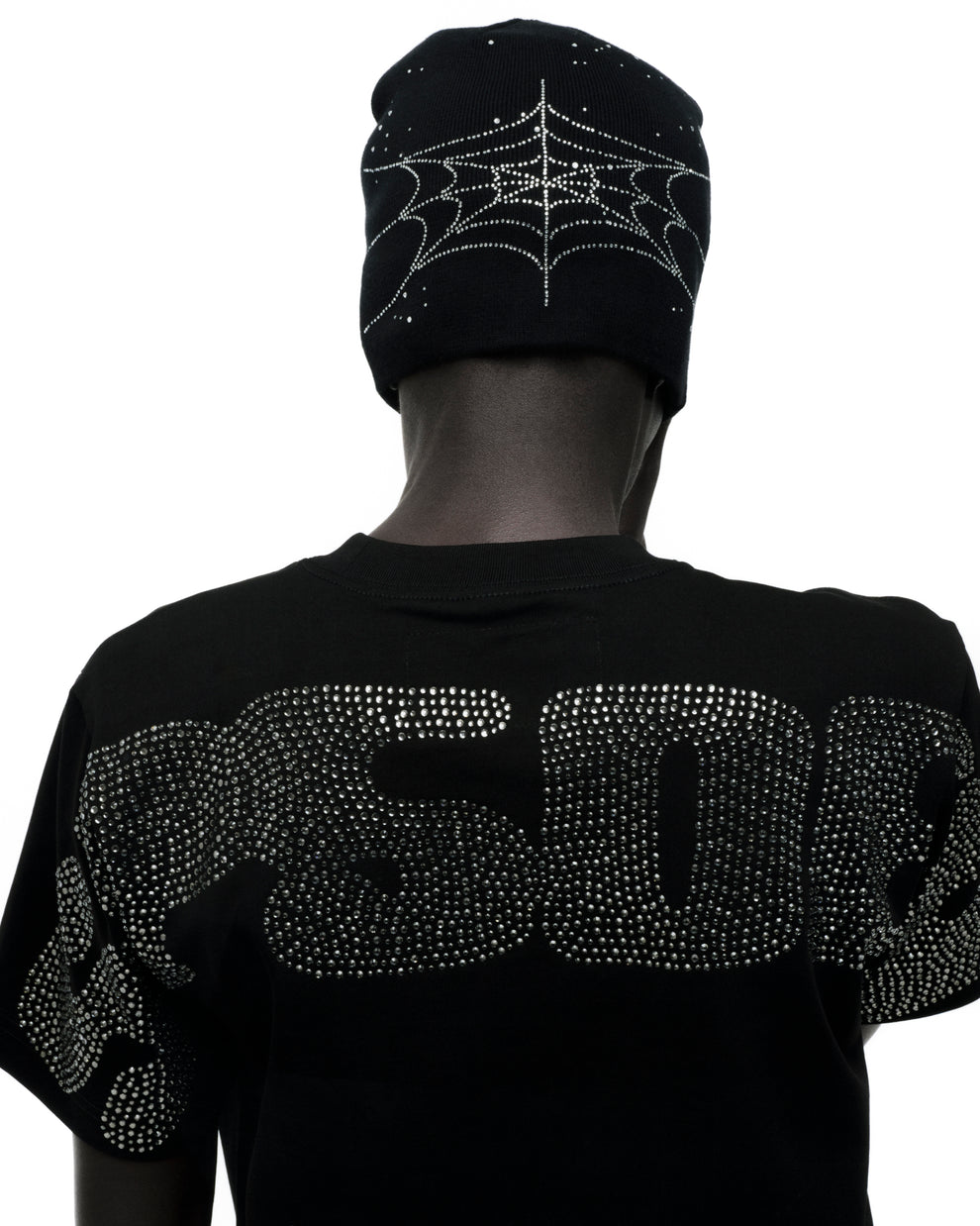 Black cotton tee with rhinestone "508" graphic on back, paired with a black beanie featuring a rhinestone spiderweb.