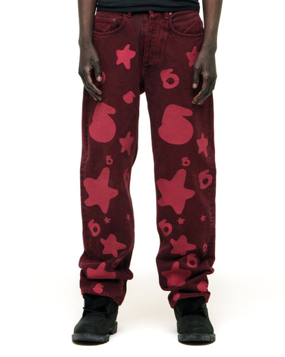 BELUGA DENIM faded wash red jeans with pink Beluga print, custom hardware, and straight leg fit.