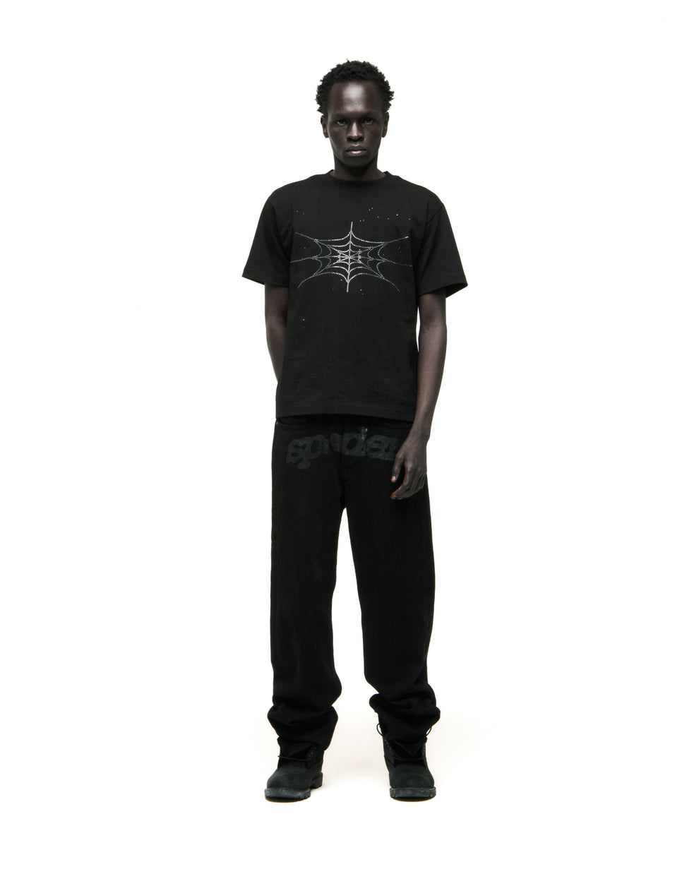 Black cotton tee with rhinestone spiderweb graphic, worn by a man.