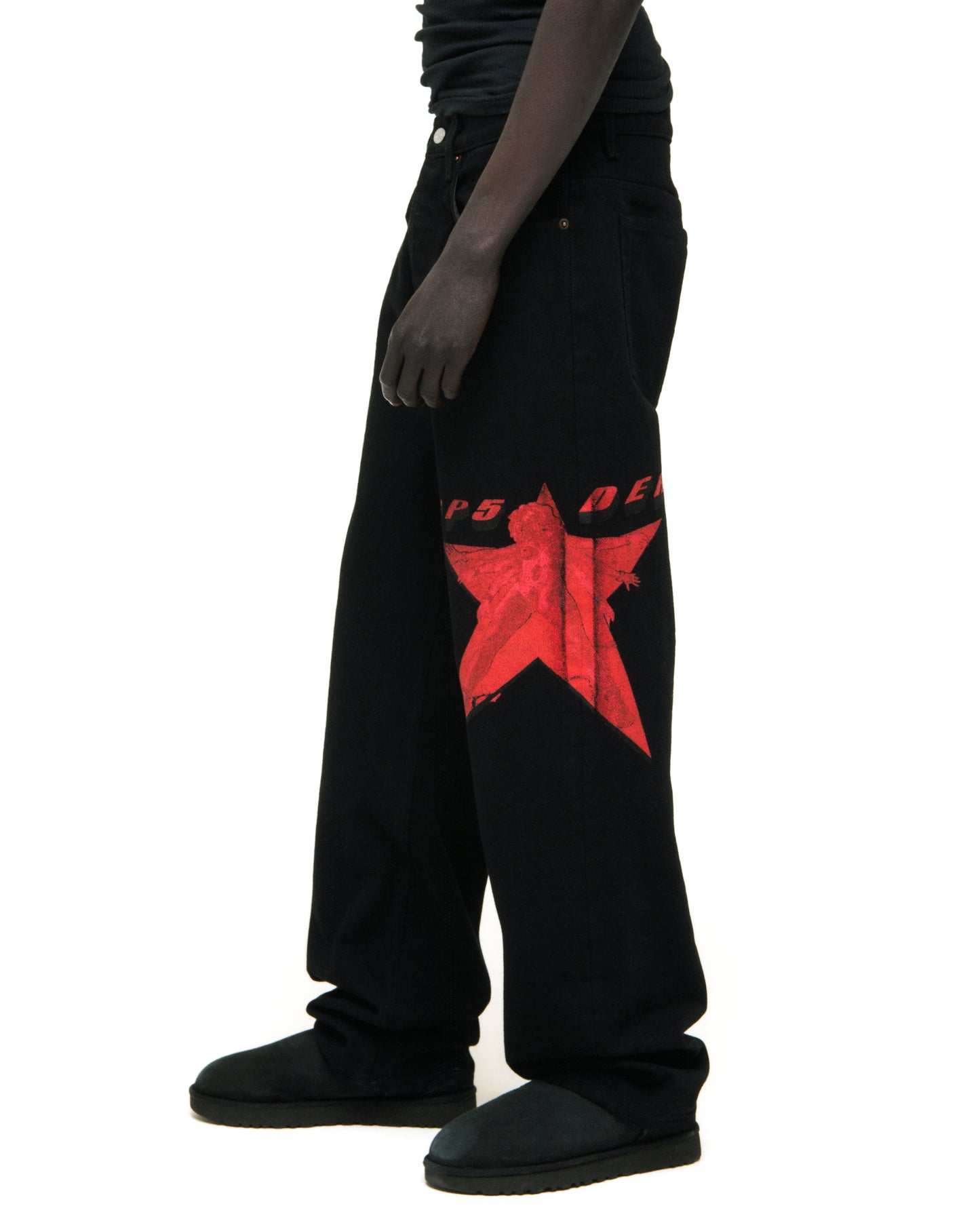 Black denim pants with a large red star graphic on the upper leg.