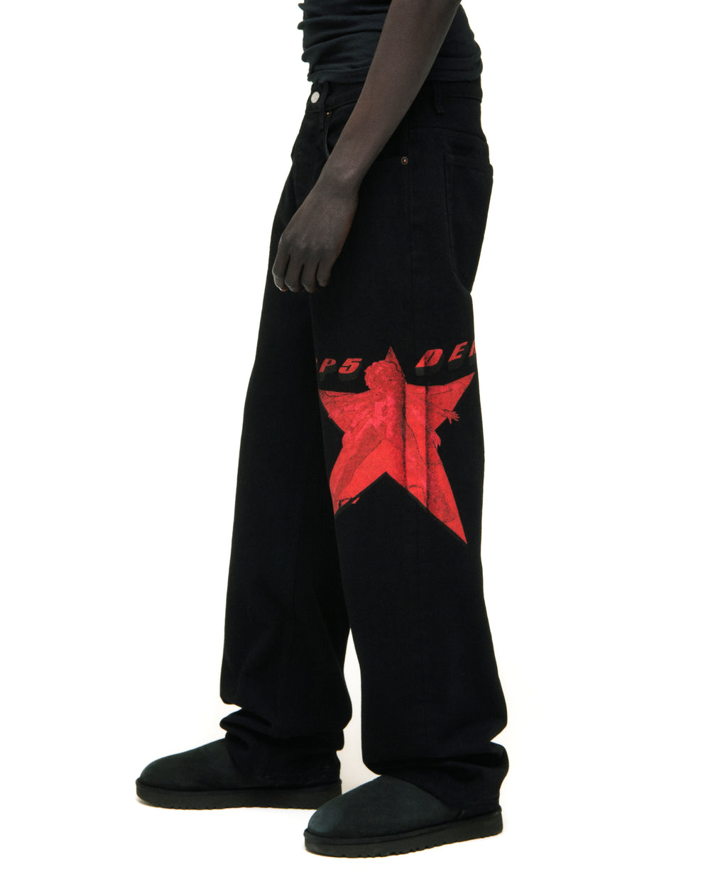 Black denim pants with a large red star graphic on the upper leg.
