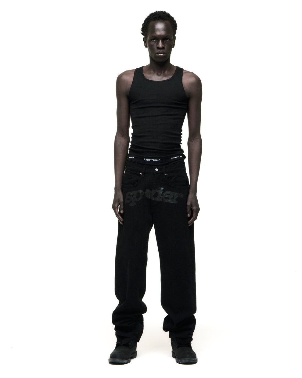 Black V3 DENIM pants with printed V3 logo at crotch, custom hardware, five-pocket styling, and straight leg fit.