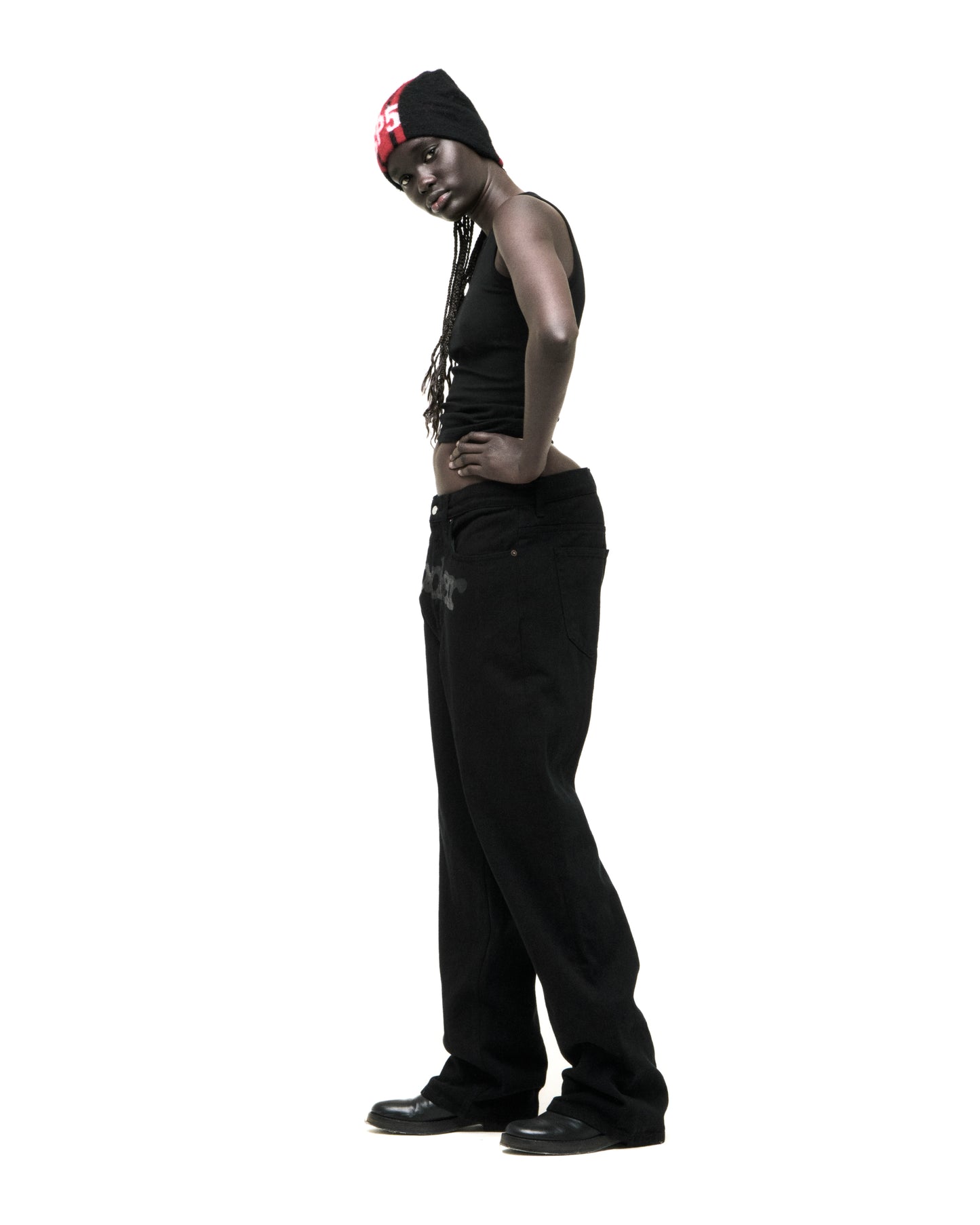 Black V3 DENIM pants with printed logo at crotch, custom hardware, and straight leg fit.