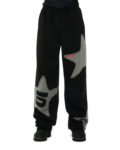 BLACK BIG STAR WIDE LEG SWEATPANT ON MODEL