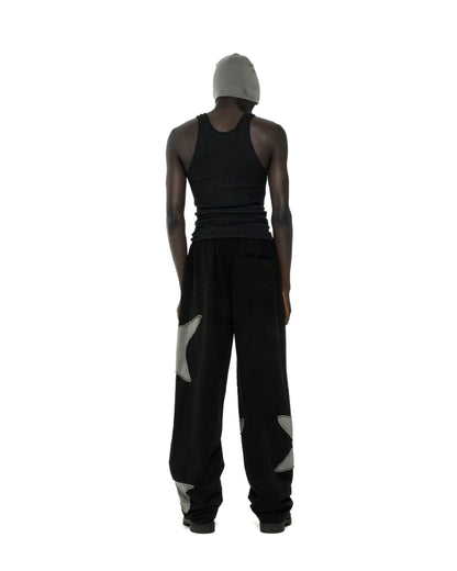 BLACK BIG STAR WIDE LEG SWEATPANT ON MODEL