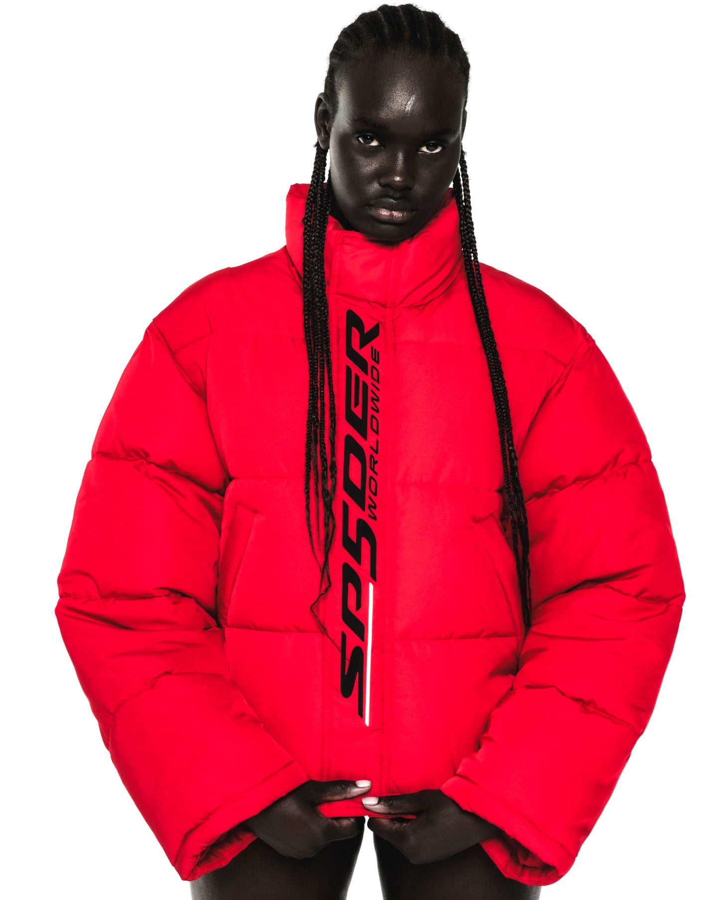 Red TRACKHAWK PUFFER JACKET with reflective "SP5DER WORLDWIDE" text along the front zip.